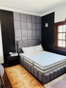 bedroom with back rest design in nepal